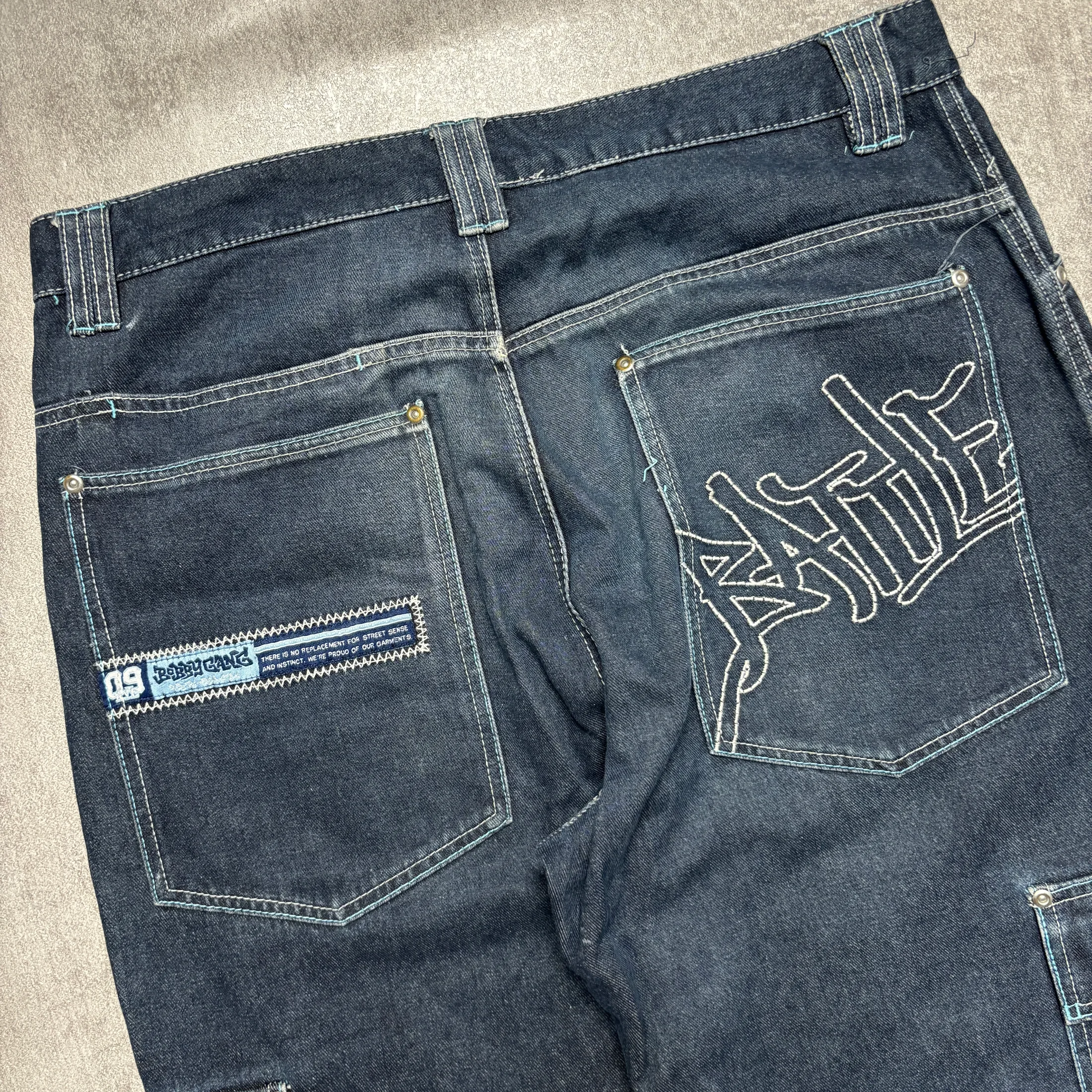 VTG BOBBY GANG ART LONG JEANS 7